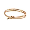 Designer Gouden Boog Armband Vrouwen Verpakking Roestvrij Stalen Strengen Ketting bij de hand Paar Cadeaus voor Vriendin Accessoires Groothandel Sieraden