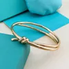 Designer Gouden Boog Armband Vrouwen Verpakking Roestvrij Stalen Strengen Ketting bij de hand Paar Cadeaus voor Vriendin Accessoires Groothandel Sieraden