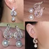 Charm Rakol Vintage CZ Crystal Imitation Pearls 심장 꽃 신부 웨딩 드롭 이어링을위한 로즈 골드 컬러 선물 보석 RE385 231006