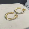 2024 R Jewelry Woman Earring Luxury Bijoux Free Fashion Fraktkrok Twisted Wire Buckle örhängen i Sterling Silver med 14K Yellow Plated