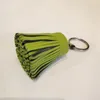 Keychains Lanyards 유명한 디자이너 브랜드 디자이너 럭셔리 정품 Lambskin 실제 가죽 음색 키 체인 펜던트 키 체인을위한 여자 소녀 가방 Charm 231006