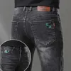 Herren-Jeans-Designer, europäischer Herbst und Winter, elastisch, schmale Passform, gerade Röhrenhose, bestickt, große Marke, Baumwolle, lange Hose, Jugend, vielseitig, E988