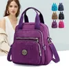 Sacos escolares Moda Mulheres À Prova D 'Água Nylon Mochila Estilo Coreano Designers Bolsa De Ombro Lazer Mochila Para Meninas Viagem Mochilas 231005