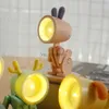 Lampy stołowe Nowe 6PCS Cartoon Mini Night Light Mały biurko Lampa Lampa Śliczna Ochrona Oczerniego Stół Światło Pies Dinozaura Dinozaur Kształt Kształt YQ231006