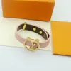 Bracciale in pelle di vacchetta con fiori e lettere di lusso per uomo e donna, universale, alla moda