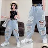 Pantaloni Pantaloni Jeans blu coreani Pantaloni Neonate Bambino Abbigliamento per bambini Denim Bot Harem Fori strappati Capris morti da 4 a 16 anni Baby, K Dhssd