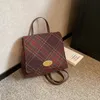 Borsa a tracolla all'ingrosso della fabbrica inverno popolare zaino di lana college vento casual zaini per studenti in pelle flip cuciture borsa moda plaid 2901 #