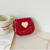 Torebki mini małe piękne torebki torba mody torebki dla dziewcząt monety na skórę łańcuchową urocze dzieci crossbody ramię mała torebka patentowa 231006