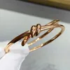 Bangle European Rose Gold Rope Knot Armband Women's High-End mode lyxmärke Högkvalitativ smycken Party Gift 231005