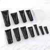 Schwarzer leerer PE-Kunststoff-Handcremebehälter, weiche Kosmetikschläuche zum Auspressen, tragbare Kosmetiktube mit Schraubverschluss F1403 Okpwv