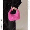 Style tissé plat panier sac épaule bandoulière pour femmes petite foule de haute qualité décontracté portable seau sacs de créateurs sac à main de haute qualité
