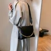 Varumärkesdag packar nischdesignpaket Ny kvinnors väska populära och mångsidiga en axel underarmspåse hinkväska