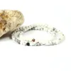 Entier 10pcs / lot Nouvelle Arrivée 4mm Naturel Blanc Howlite Perles De Pierre De Marbre Avec Micro Pavé Noir Cz Boule Bracelet De Perles Pour Gi328o