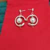 Boucle d'oreille populaire espagnole originale mode 925 couleur argent blanc perle avec encoche cercle broche INORBIT boucles d'oreilles UNO de 50 Jewelr178J