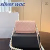 Bolsa de designer de bolsas woc bolsa de designer de ombro feminino bolsa de alta qualidade bolsa de couro genuíno rosa saco de cadeia branca preta pérola bola de diamante de diamante