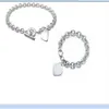 2020 chaîne épaisse en acier inoxydable disponible à bas prix avec bracelet en anneau de plaque de coeur et colliers pendentif sertis avec boîte et da2672
