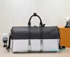 Designers Duffel Sacs de luxe grande capacité vente de voyage femmes hommes véritable sac à bandoulière en cuir de mode porter des rivets avec serrure