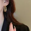 Boucles d'oreilles créoles Minar minimaliste couleur or métallique ajouré goutte d'eau torsadée pour femmes, bijoux français