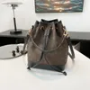 2023 NYA PU Material Bucket Bag High Sense Pull-Belt Small Påsar Stitching Mini Bag One-Shulder Crossboby Påsar