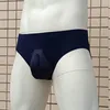 Cuecas sexy homens briefs grande bolsa u convexo tangas sem costura sólida g-string baixo-rise hip elevador calcinha fina respiração bikini roupa interior