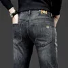 Mäns jeans designer designer fokus på stora märken avancerade mörkgrå jeans, mäns elastiska smala passande unga byxor, tjocka varor wsg2 gszu uq9b