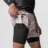 Herr shorts sommar dubbel lager 2-i-1 sport capris mode blixtlåsficka multifunktionsbyxor