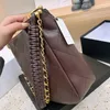 Diseñador Mujeres 23a Bolsa Hobo Bolso de hombro Vintage Luxury France Chaneil Correa de cuero tejido Hobos pequeños Hippie Hippie Lady Bolsas de compras negras