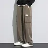 Herrbyxor hösten stora fickbyxor Sweatpants Multi-Pockets Drawstring Fashion Casual Track Pant Man Loose Straight Large