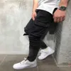 Skinny Biker Jeans Uomo Multi-tasca Fasciatura Slim Cargo Pantaloni da jogging per uomo Moto Hip hop Streetwear Swag Denim Pants243o