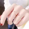 Japon et Corée du Sud Simplicité CNC Desinger Trois Diamants Bague Mode Femme Titane Acier Plaqué Or Rose Couples En Gros