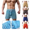 Vêtements de nuit pour hommes Hommes Shorts lâches Sexy Creux Out Résille Sous-vêtements Boxer Cordon Lounge Mâle Housewear Mesh Respirant Plage