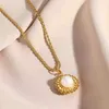 Halsketten mit Anhänger, rund, eingelegt, schöne Perle, Damenmode, Retro, Titanstahl, vergoldet, Sonnenblumen-Halskette, Schlüsselbein
