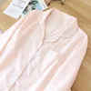 Kobietowa odzież sutowa wiosna letnia pary leżakowe piżamę 2pcs pionowe paski bawełniane długi rękawe męskie domowe domy noszone kobiety