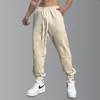 メンズパンツ秋の綿カジュアルメンジョガースウェットパンツジムフィットネスランニングスポーツズボンの男性トレーニング衣料品の底部トラックパンツ
