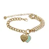 Tiffanylris lyxiga smycken designer charm armband populardesigner stål 18k guld t hem klassisk blå kärlek asymmetriska armband kvinnor fas hbw9