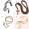 Collares colgantes Moda Estilo retro Hombres Mujeres Católico Cristo Rosario de madera Cuentas Cruz Collar de cuerda tejida