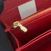 10A Porte-passeport Porte-monnaie Noël VIVIENNE Voyage VACANCES Nouveau créateur de mode Femmes Sacs à main Embrayage Porte-cartes de crédit Vente limitée en cuir véritable