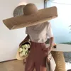 Moda mujer grandes sombreros de paja sombrero para el sol playa protección contra el sol gorra de paja plegable cubierta de gran tamaño sombrilla plegable playa str186R