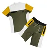 Herr tee tvåstycksdesigner mode t-shirt shorts träning långsam körning tryckt brev sommar avslappnad kvinnors sport 235g
