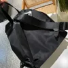 Borse classiche unisex Zaino in nylon Zaino nero Borse a tracolla con segno triangolare Tasche multiple di buona qualità