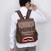 Mochila coreana de cuero de alta capacidad para hombre, morral a cuadros a la moda, bolso escolar para estudiantes, bolso de viaje para ordenador, novedad de 2023 231008