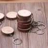 Nyckelringar 10st oavslutade naturliga träskivor tomma handmålade smycken som gör grossistdroppar