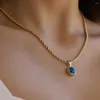 Pendentif Colliers Oeil du Diable Intégré Bleu Rond Zircon Collier Titane Acier Plaqué 18K Or Twist Chaîne Femmes Bijoux Cadeau