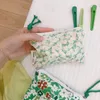 Sacs à cosmétiques Sac à fleurs vert pour femmes Petites serviettes hygiéniques Maquillage Rouge à lèvres Coton Porte-monnaie Poche