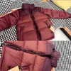 ZYIK Erkek ve Kadınlar Down Parkas 23SS Tasarımcı Ceketler Kış Puffer Kaliteli Kışlar Rüzgar Proof ve Su Geçirmez