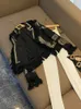 2023 Autumn Black Contrast Color Tassel Paneled Tweed Jackel långärmad hakad-Lapel Classic Outwear Coats O3O072586