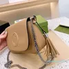 الخريف والشتاء الجديد Blondie Armpit Bag Long Long Counder Strap Messenger Round Roundlocking Double Mini Bebag