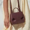 Französische Designertaschen Pole Shoulder Umhängetasche Damenhandtasche Echtes Leder Commuting Smiley Face Bag Tragbare kleine Tasche 231015