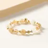Charm-Armbänder Mondlichtweißes Kristallarmband mit goldenem Haar für Wohlstand