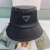 Nylon Bucket Hat For Men and Women Classic Designer Fashion Metal Sun Caps Black Fisherman Beach Sun Visor hats Folding Bowler Fla270y